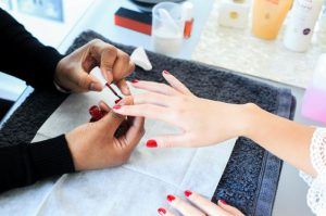 red manicure nail care