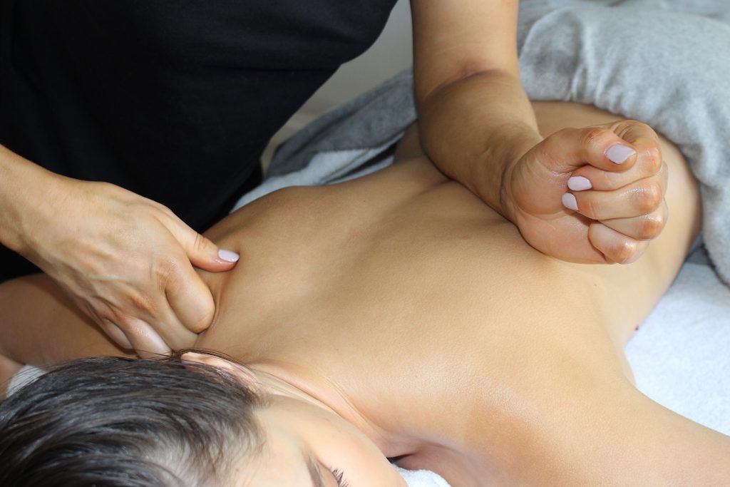 woman getting a back massage